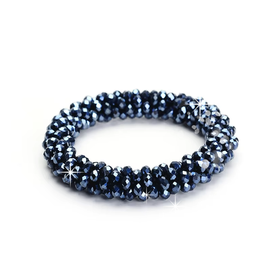Navy/Dark Blue JuulC elastic and stretchy Bun Tie with sparkling imitation diamond stones, to create a dressage show bun for the rider