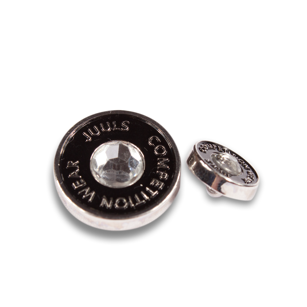 One large button and one small sleeve button in black that come with the JuulC Buttonset Strass with Crystal stone in the middle